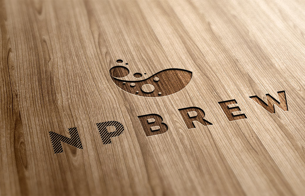 Гравировка на дереве логотипа компании NP Brew